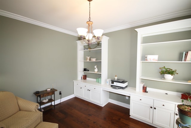 home office featuring a notable chandelier, dark hardwood / wood-style floors, built in desk, and crown molding