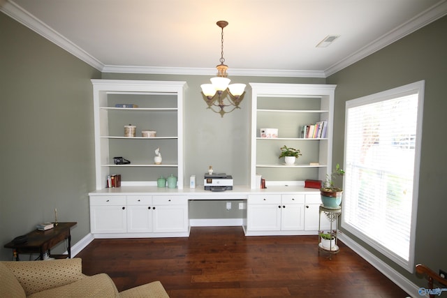 bar featuring white cabinets, crown molding, dark hardwood / wood-style floors, built in desk, and decorative light fixtures