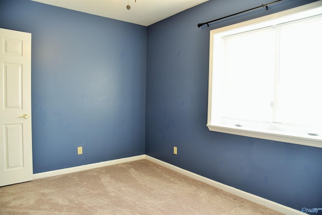 view of carpeted spare room