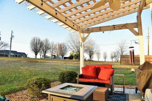 view of patio / terrace with a pergola, area for grilling, and an outdoor fire pit