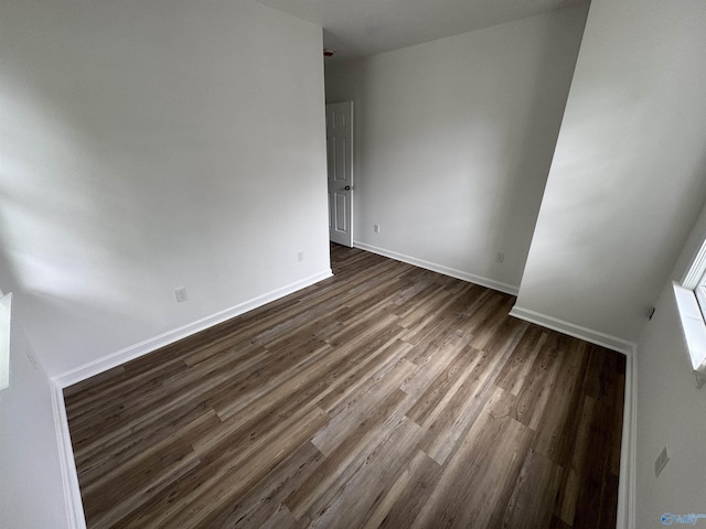 2217 Beasley Ave NW, Huntsville, AL 35816 - unfurnished room featuring dark wood-style flooring and baseboards