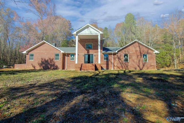 view of front of home with a front yard