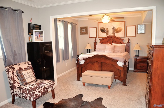 bedroom featuring ceiling fan, light colored carpet, and ornamental molding