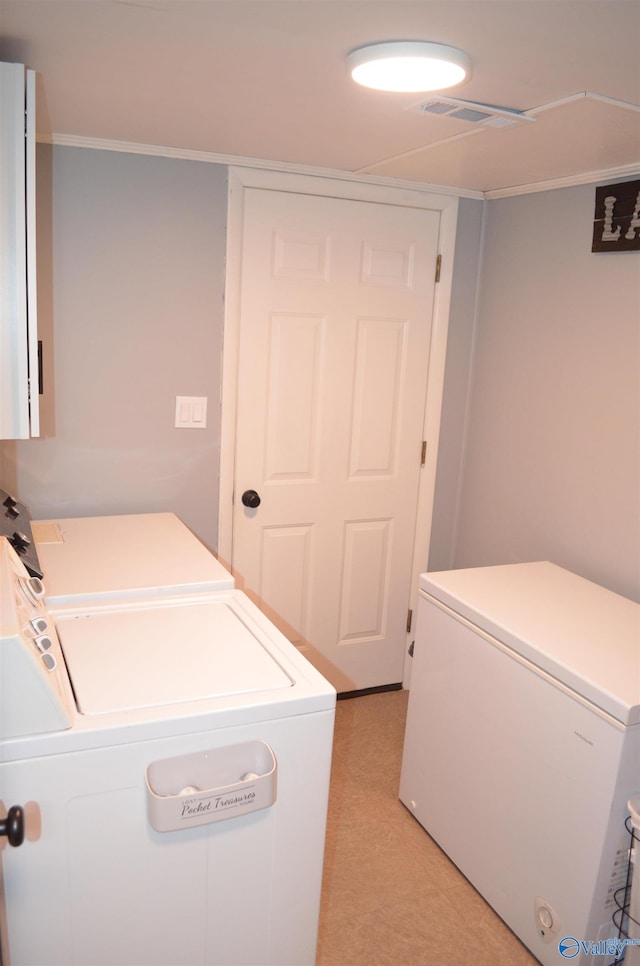 laundry room with washer and dryer