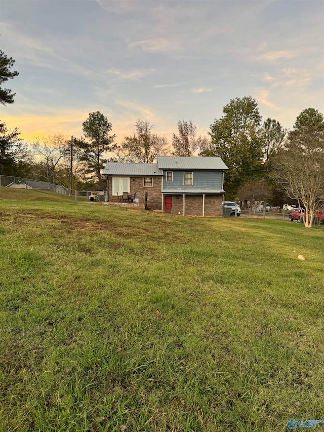 exterior space featuring a lawn