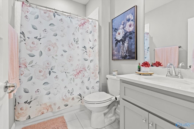 full bathroom featuring tile patterned floors, vanity, toilet, and shower / bathtub combination with curtain