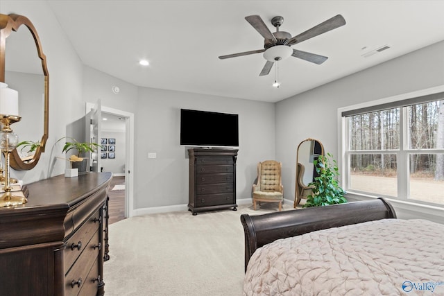 carpeted bedroom with ceiling fan