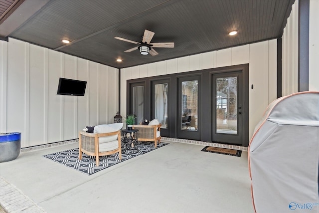 view of patio featuring ceiling fan