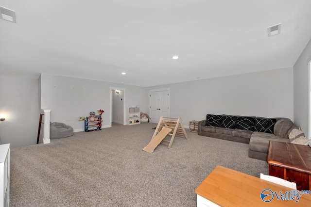 rec room with carpet, visible vents, baseboards, and recessed lighting