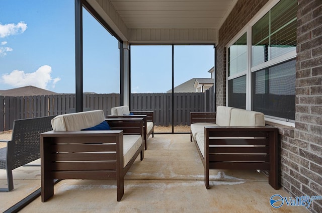 view of patio featuring fence and an outdoor living space