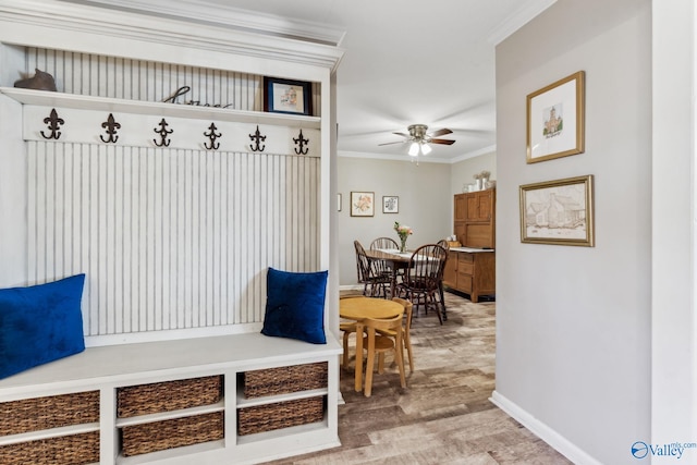 mudroom with ceiling fan, wood-type flooring, and ornamental molding