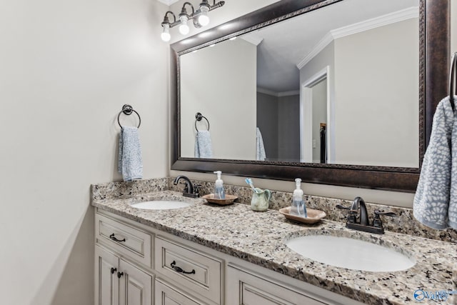 bathroom featuring vanity and ornamental molding