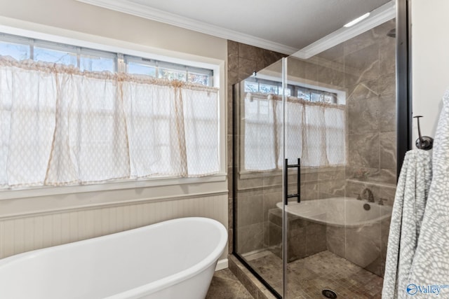 bathroom with shower with separate bathtub and ornamental molding