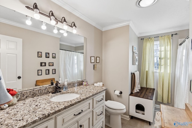 bathroom with tile patterned flooring, toilet, vanity, and ornamental molding