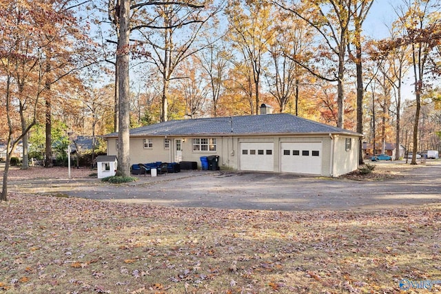 exterior space featuring a garage