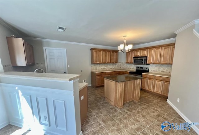 kitchen with an inviting chandelier, tasteful backsplash, decorative light fixtures, ornamental molding, and appliances with stainless steel finishes