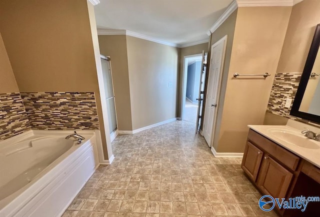 bathroom featuring ornamental molding, vanity, a bath, and backsplash