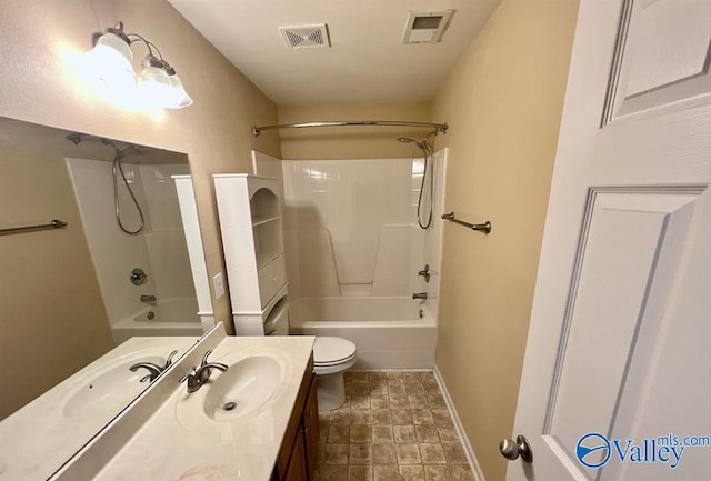 full bathroom featuring vanity, shower / tub combination, and toilet