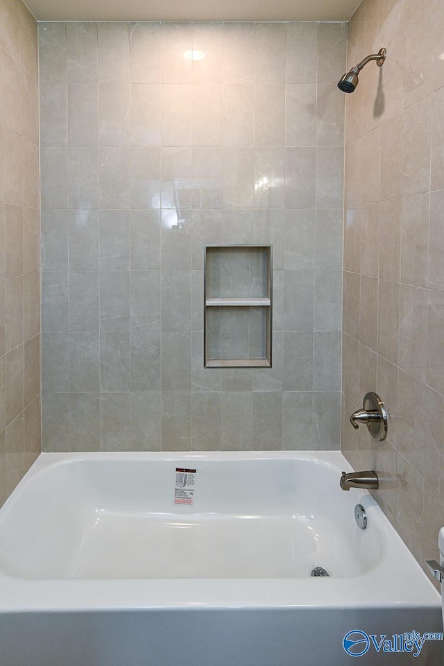 bathroom featuring shower / washtub combination