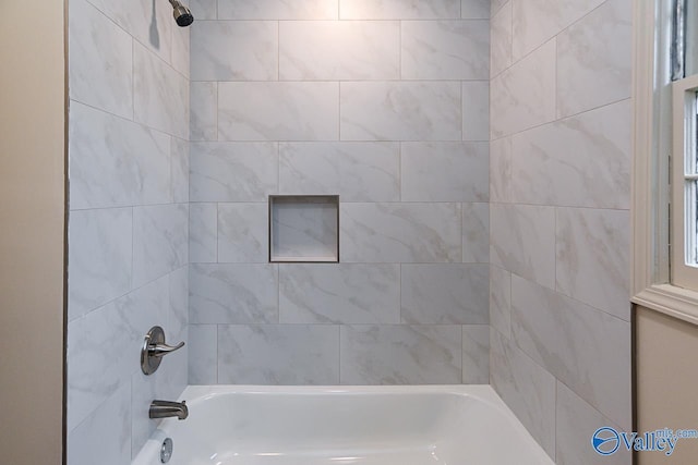 bathroom featuring shower / washtub combination