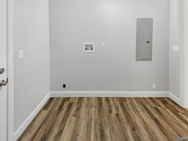 washroom with washer hookup, dark wood-type flooring, electric panel, and hookup for an electric dryer