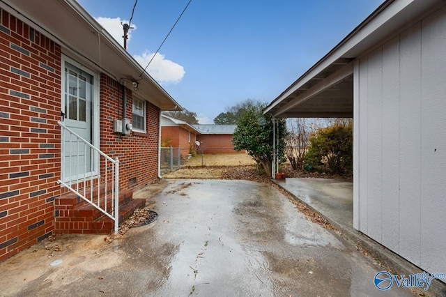 view of patio featuring a carport