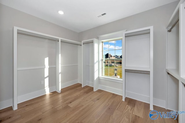 interior space with hardwood / wood-style floors