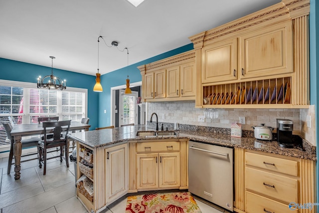 kitchen with dishwasher, sink, a notable chandelier, kitchen peninsula, and decorative light fixtures