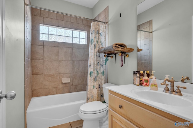 full bathroom featuring toilet, vanity, tile patterned floors, and shower / bathtub combination with curtain