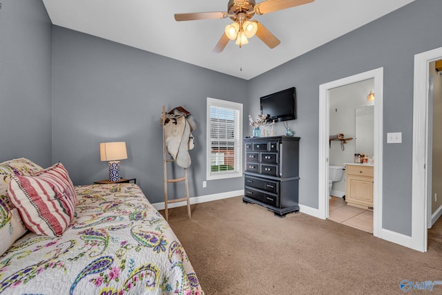 bedroom featuring carpet, connected bathroom, and ceiling fan