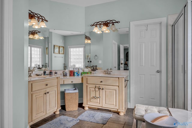 bathroom with tile patterned flooring and vanity