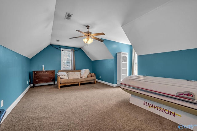 carpeted bedroom featuring ceiling fan and lofted ceiling