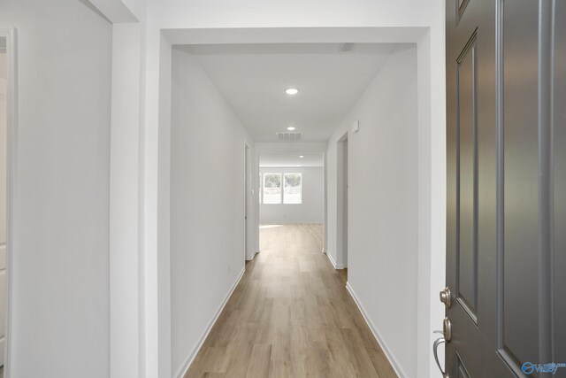 corridor featuring light wood-type flooring