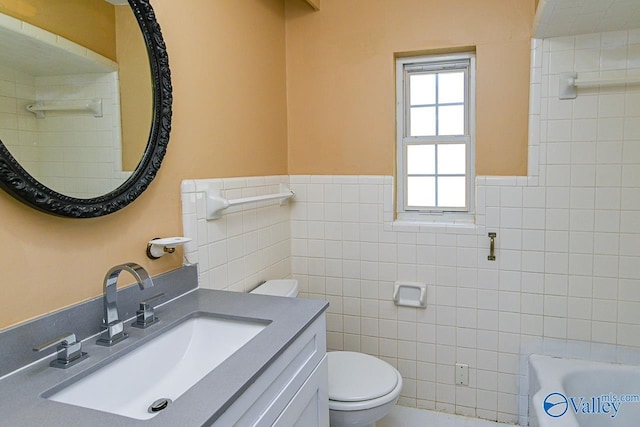148 Maple Blvd, Gurley, AL 35748 - bathroom featuring vanity, tile walls, a washtub, and toilet