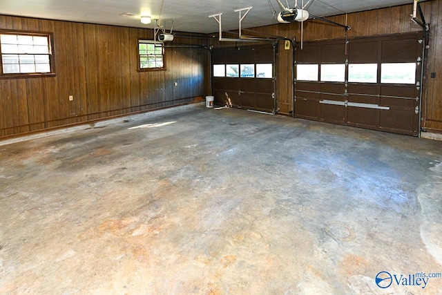 148 Maple Blvd, Gurley, AL 35748 - garage with a garage door opener and wooden walls