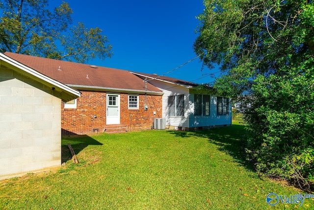 148 Maple Blvd, Gurley, AL 35748 - rear view of house featuring a yard and central AC unit
