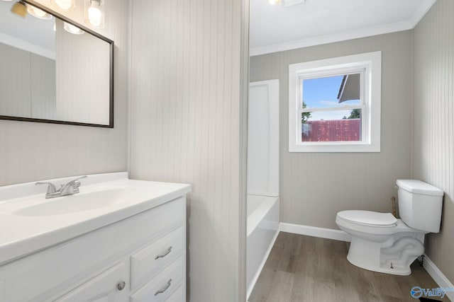 431 County Road 449, Town Creek, AL 35672 - full bathroom with toilet, wood finished floors, crown molding, vanity, and a bathtub