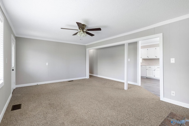 431 County Road 449, Town Creek, AL 35672 - unfurnished bedroom with crown molding, carpet flooring, baseboards, a closet, and a ceiling fan