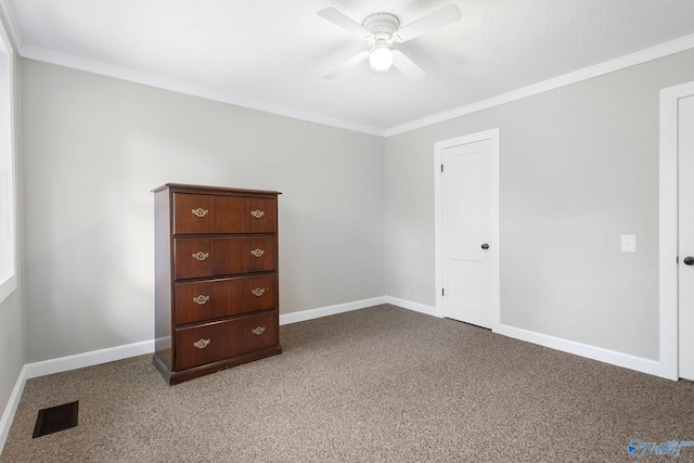 431 County Road 449, Town Creek, AL 35672 - unfurnished bedroom with carpet flooring, ornamental molding, baseboards, and ceiling fan