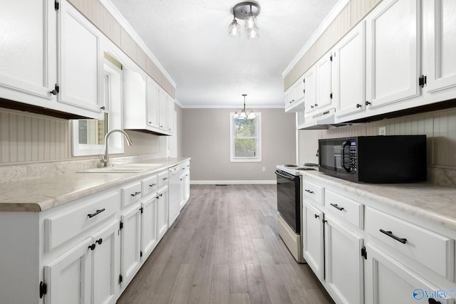431 County Road 449, Town Creek, AL 35672 - kitchen featuring white appliances, a sink, baseboards, white cabinets, and crown molding