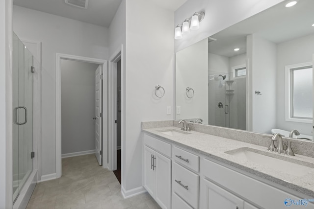 1603 Calistoga Cir, Huntsville, AL 35811 - bathroom featuring a stall shower, double vanity, tile patterned floors, and recessed lighting