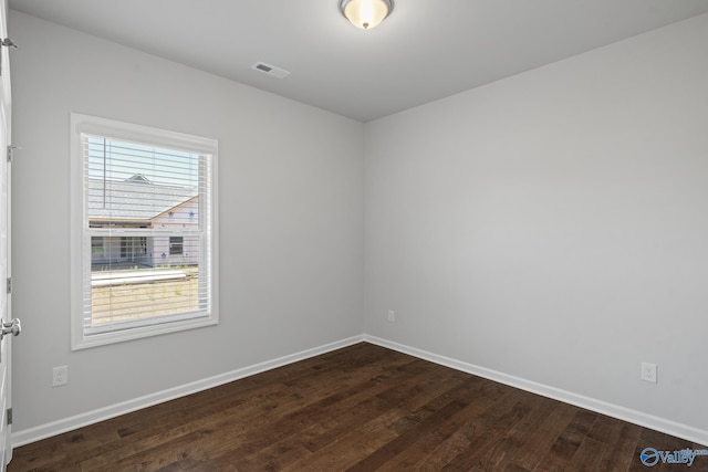 1603 Calistoga Cir, Huntsville, AL 35811 - unfurnished room with baseboards and dark wood finished floors