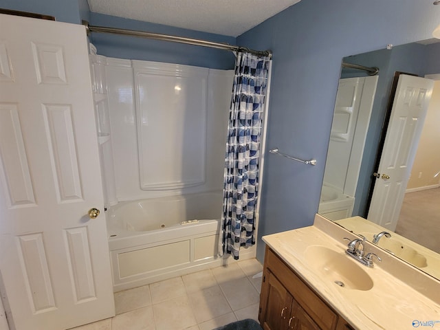 bathroom with tile patterned floors, vanity, shower / bathtub combination with curtain, and a textured ceiling