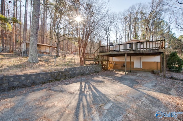 rear view of house with a deck