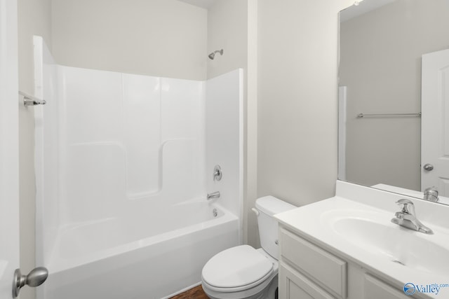 full bathroom with vanity, bathing tub / shower combination, and toilet