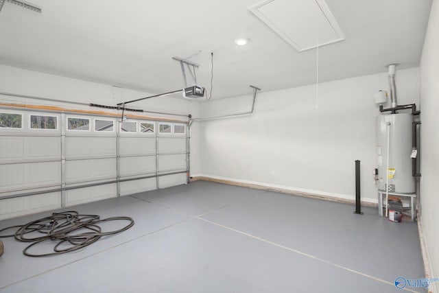 garage with a garage door opener and gas water heater