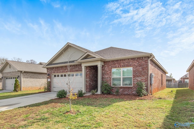 view of front facade with a garage and a front yard