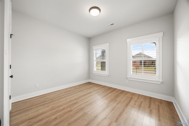 21837 Natures Cove Dr, Athens, AL 35613 - spare room with light wood-style flooring and baseboards