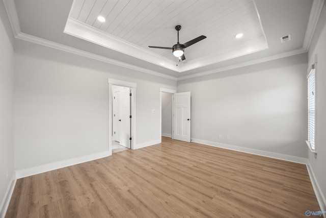 unfurnished bedroom with ceiling fan, a raised ceiling, and light hardwood / wood-style flooring