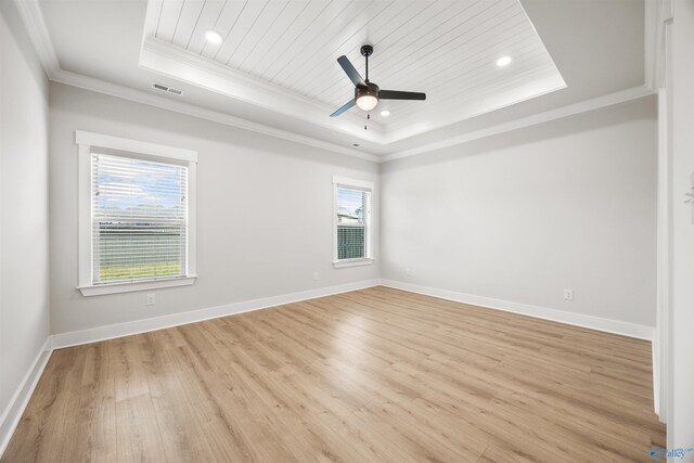 21837 Natures Cove Dr, Athens, AL 35613 - unfurnished room featuring a tray ceiling, ornamental molding, light wood finished floors, a ceiling fan, and recessed lighting